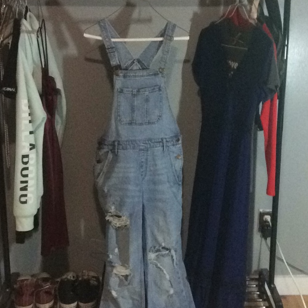 Distressed jean overalls